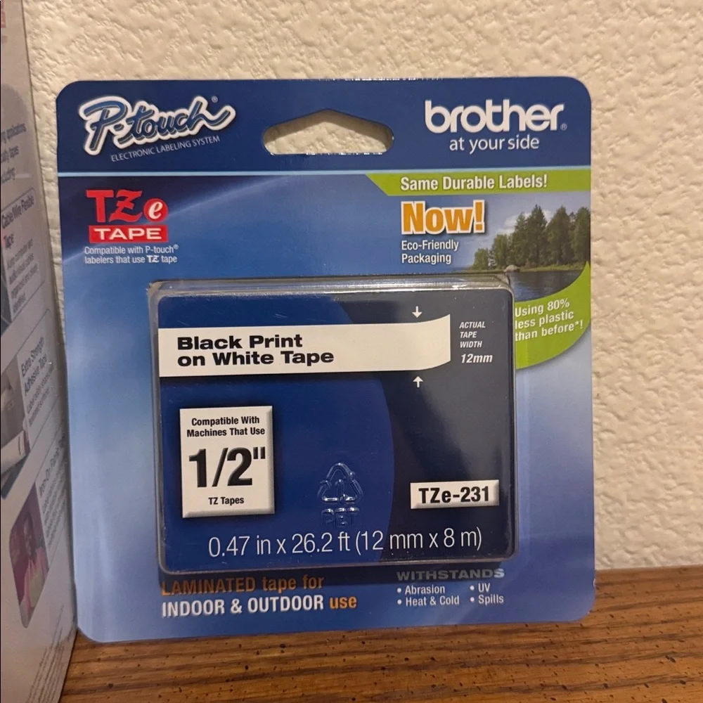 New Brother PT-2030 Label Maker with Black Print on White Tape